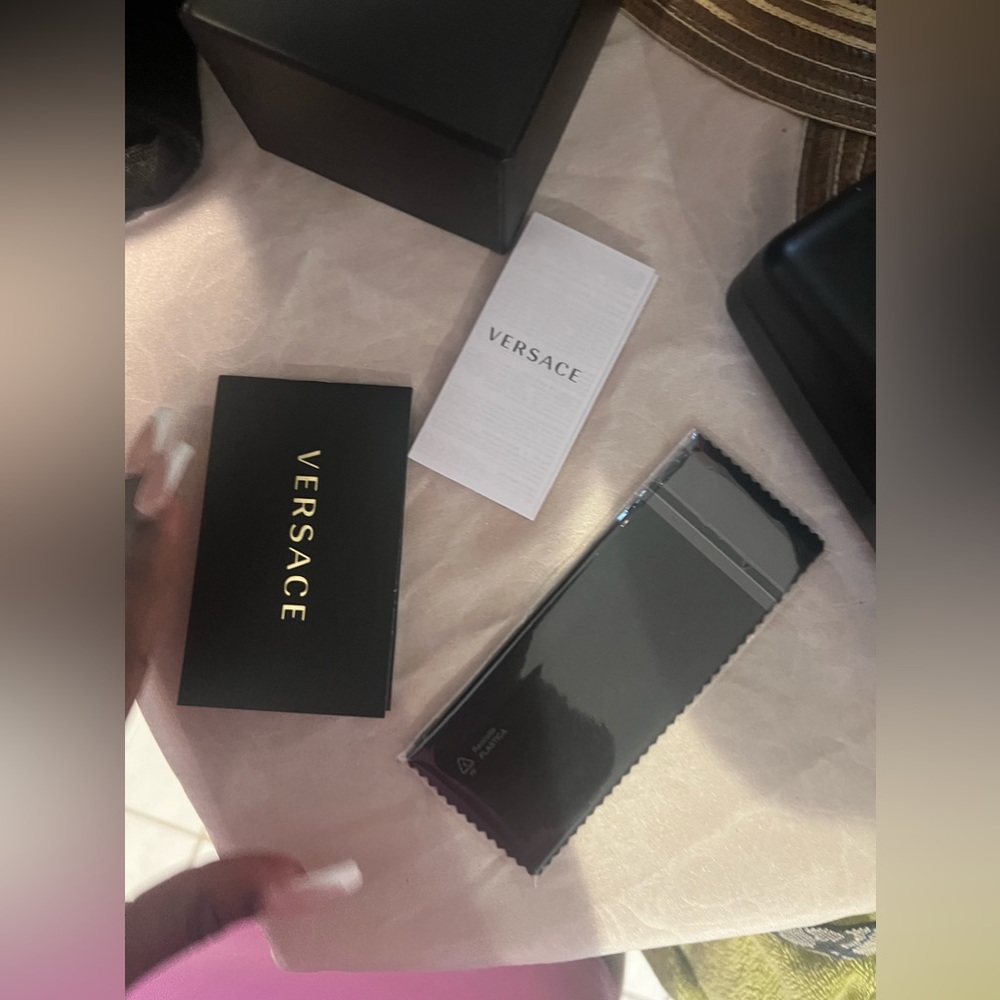 Versace sunglasses case. (Sunglasses not included)